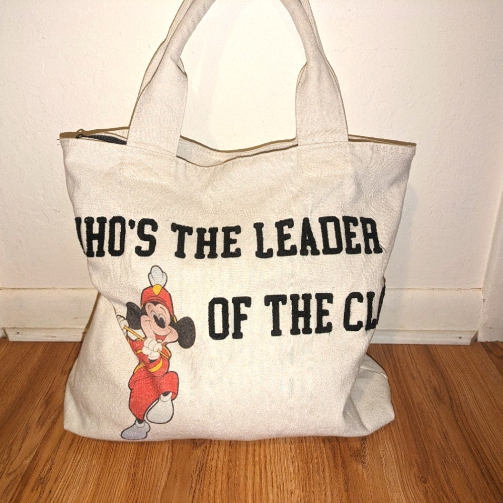 Mickey Mouse official Disney store tote bag with zippered closure.
